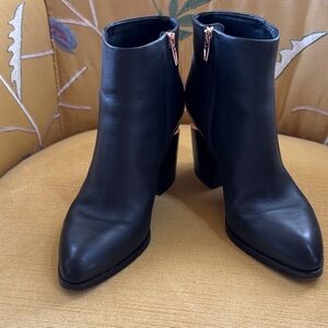 Alexander Wang black rose gold heeled booties.